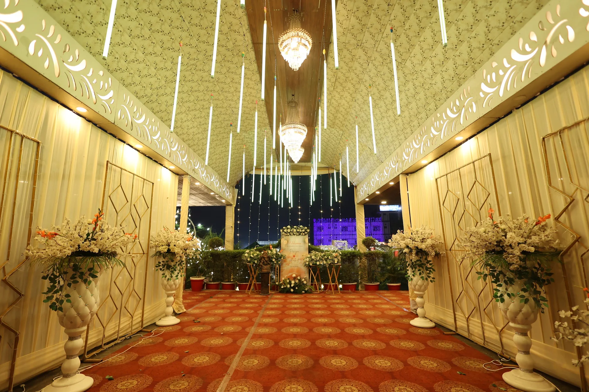 Chandeliers and floral arrangements along the real Bhandari Farms entrance
